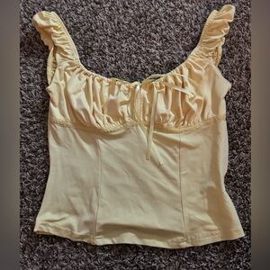 yellow ruffle top